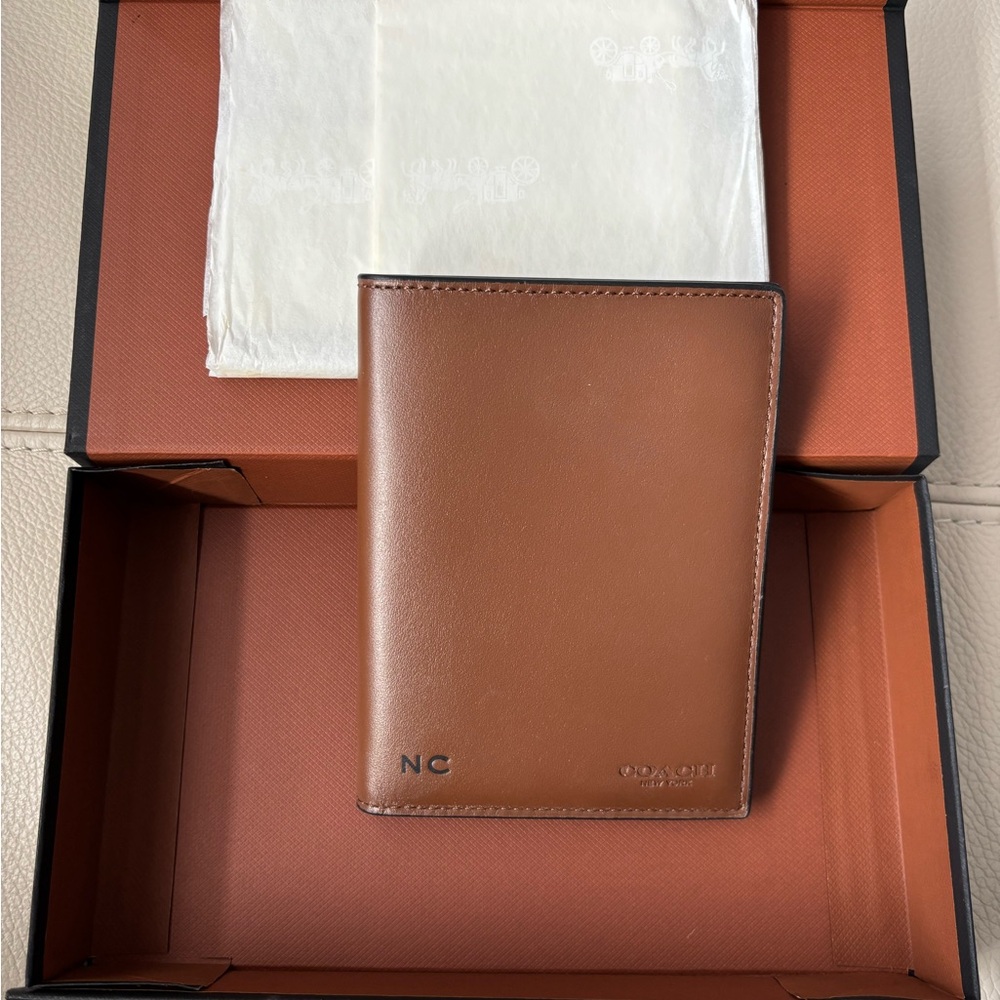 PRICE DROP! Coach passport cover monogrammed with initials NC - never used.